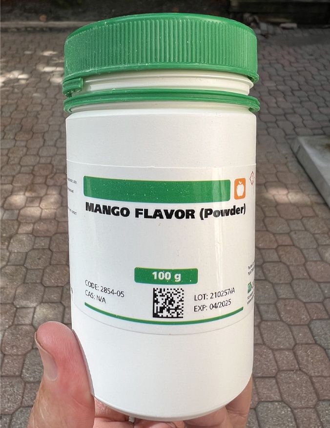 Roman - Mango Flavor Powder bottle